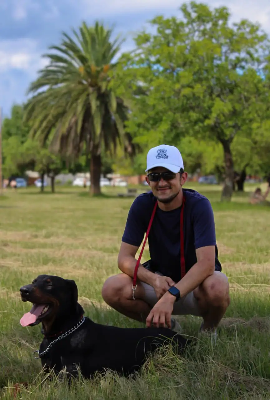 Dog walker providing leash training and exercise in Centurion park